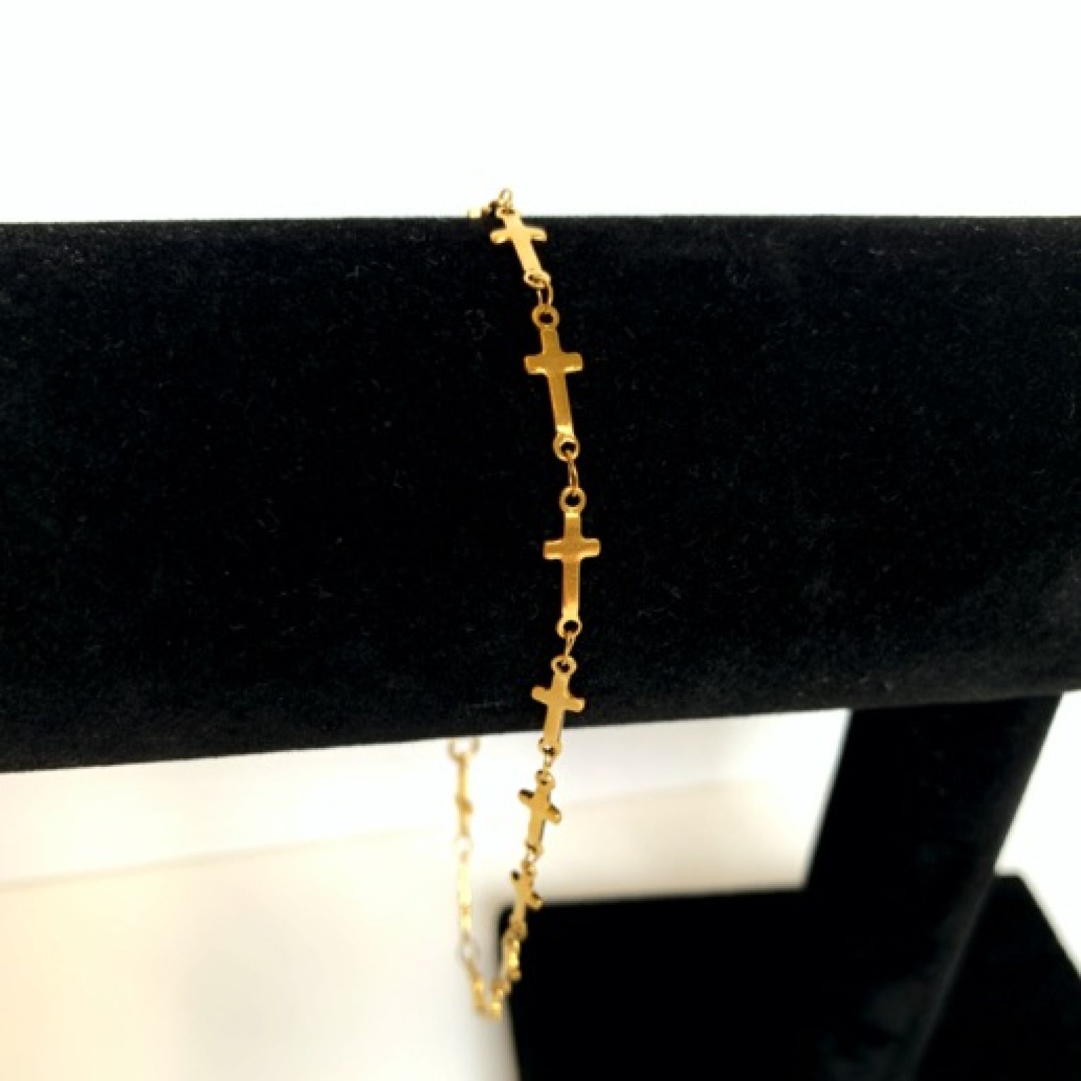 MA47701 - Enkelbandje geschakelde kruisjes goud